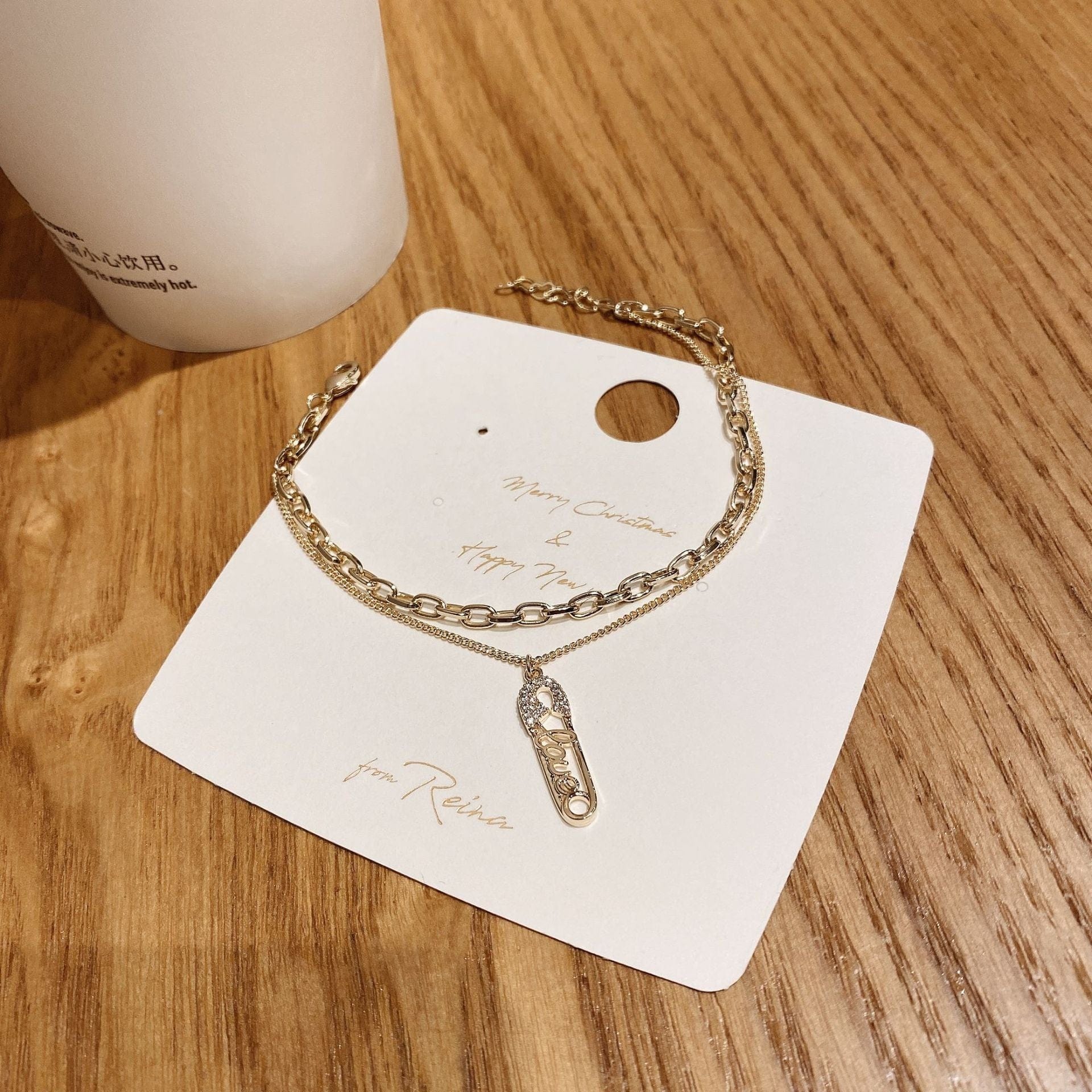 Double Layered Gold Chain Bracelet with Safety Pin Charm - Image 2