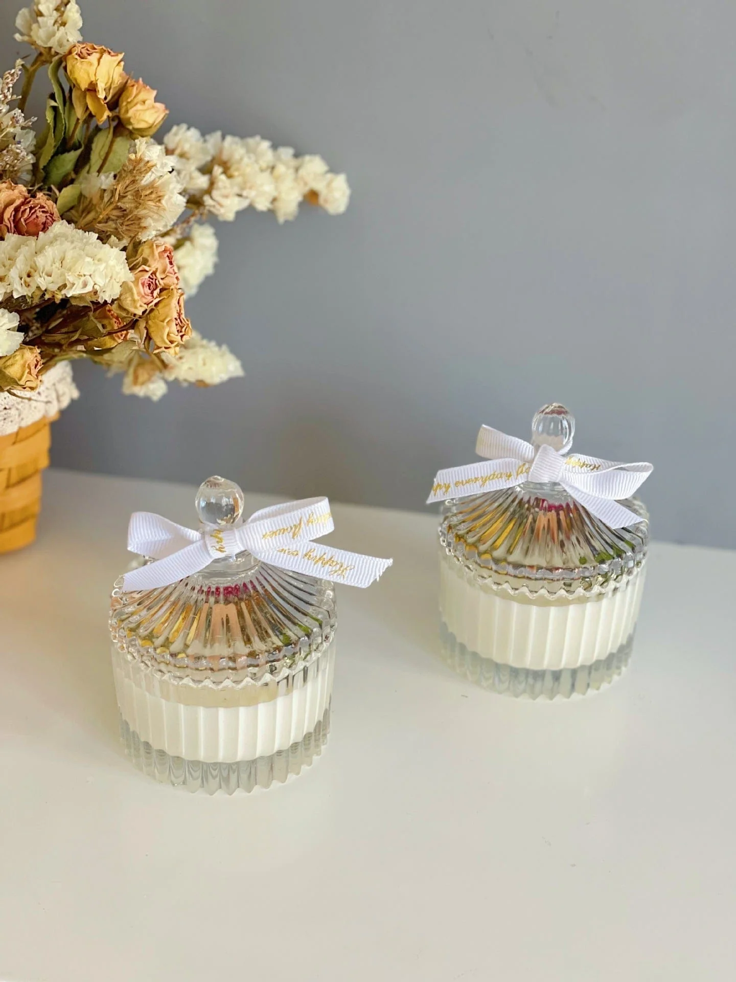 Floral White Candle in Clear Glass Jar - Image 2