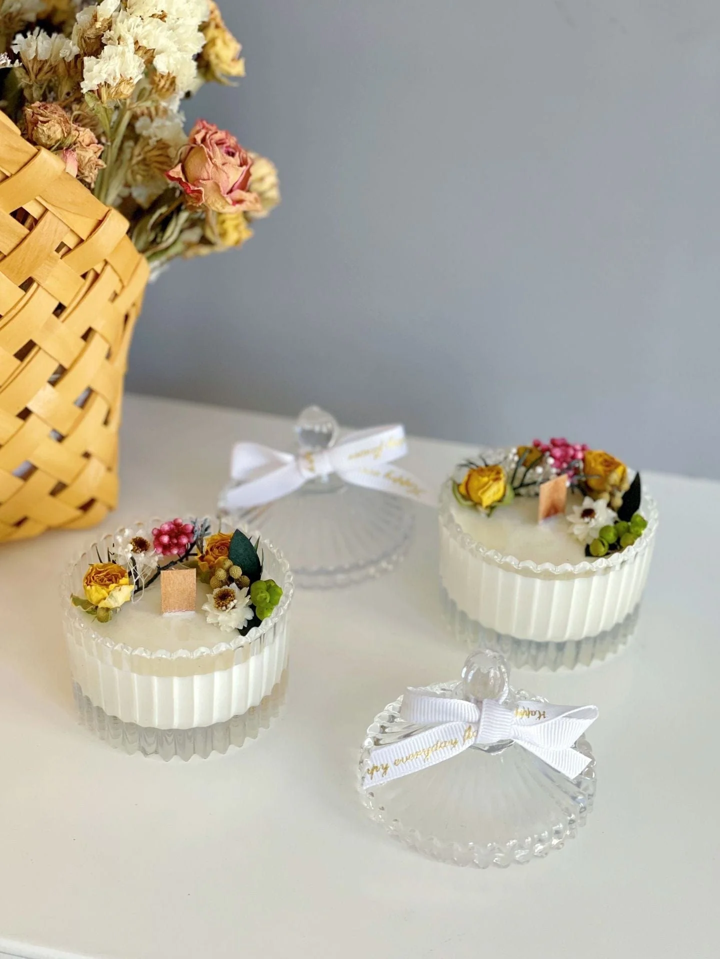 Floral White Candle in Clear Glass Jar - Image 5