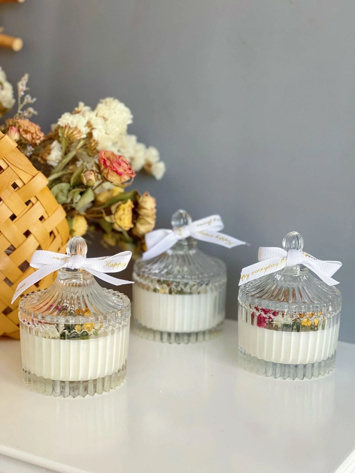 Floral White Candle in Clear Glass Jar - Image 6