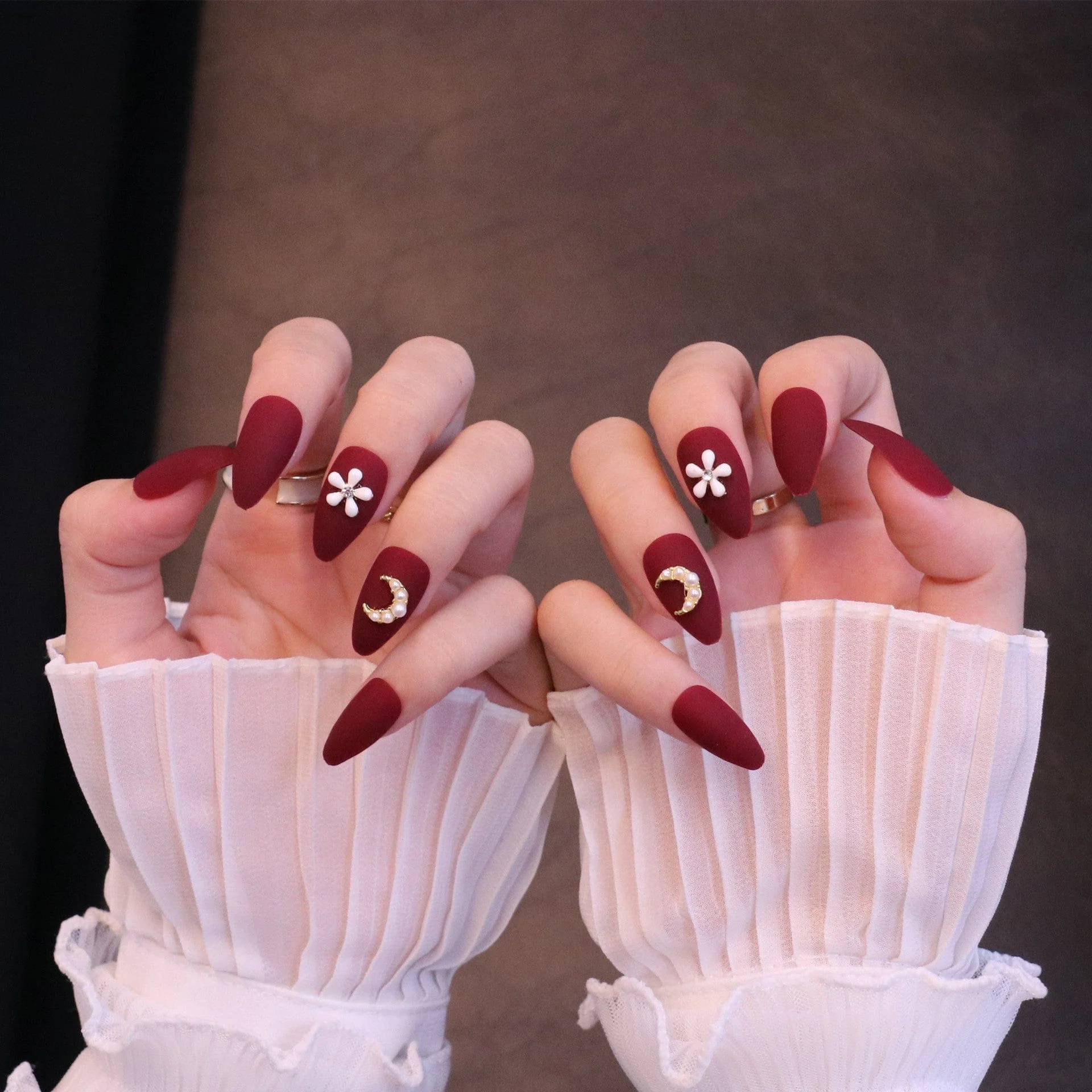 Medium Almond Matte Red Press On Nails with Flower and Moon Charms - Image 2