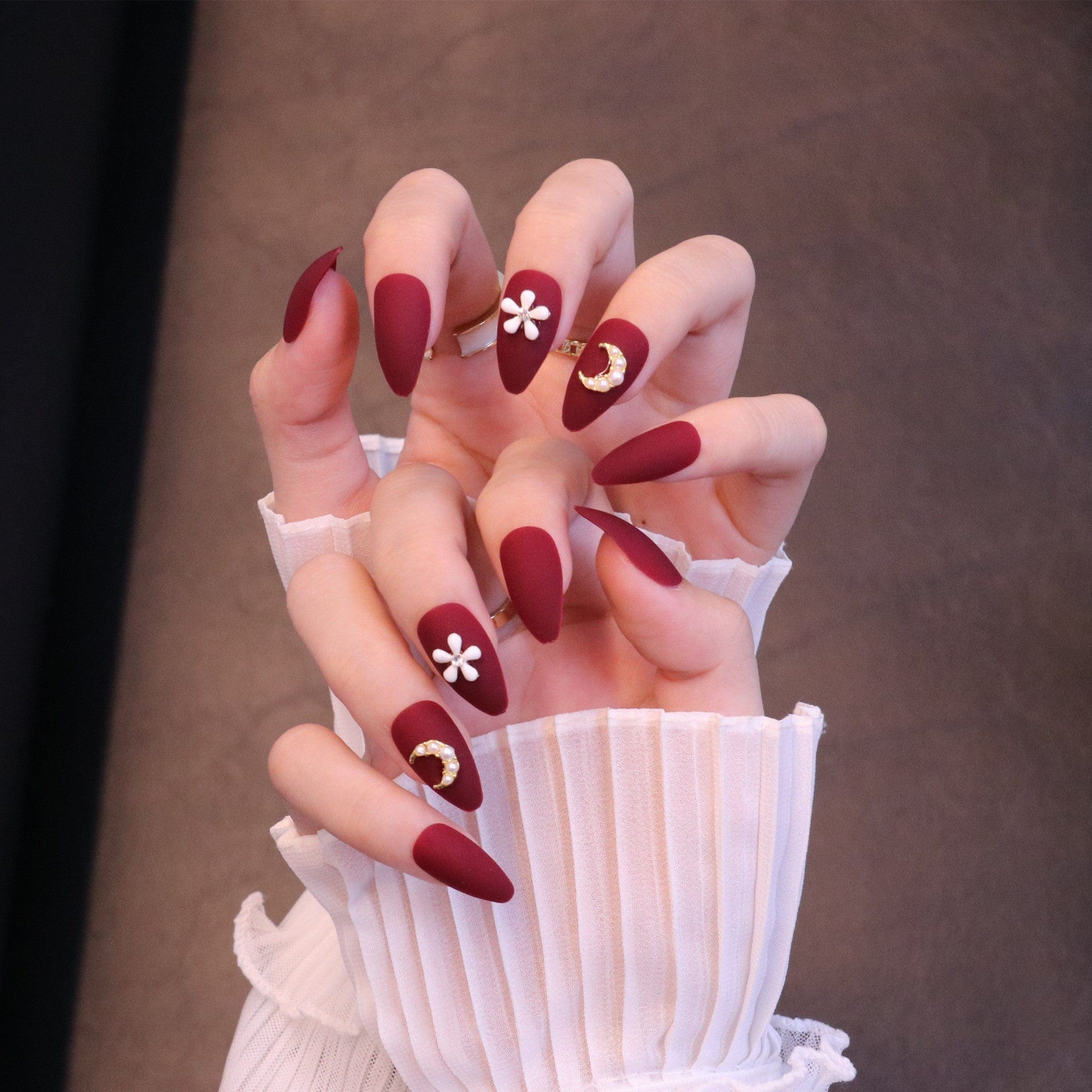 Medium Almond Matte Red Press On Nails with Flower and Moon Charms - Image 3