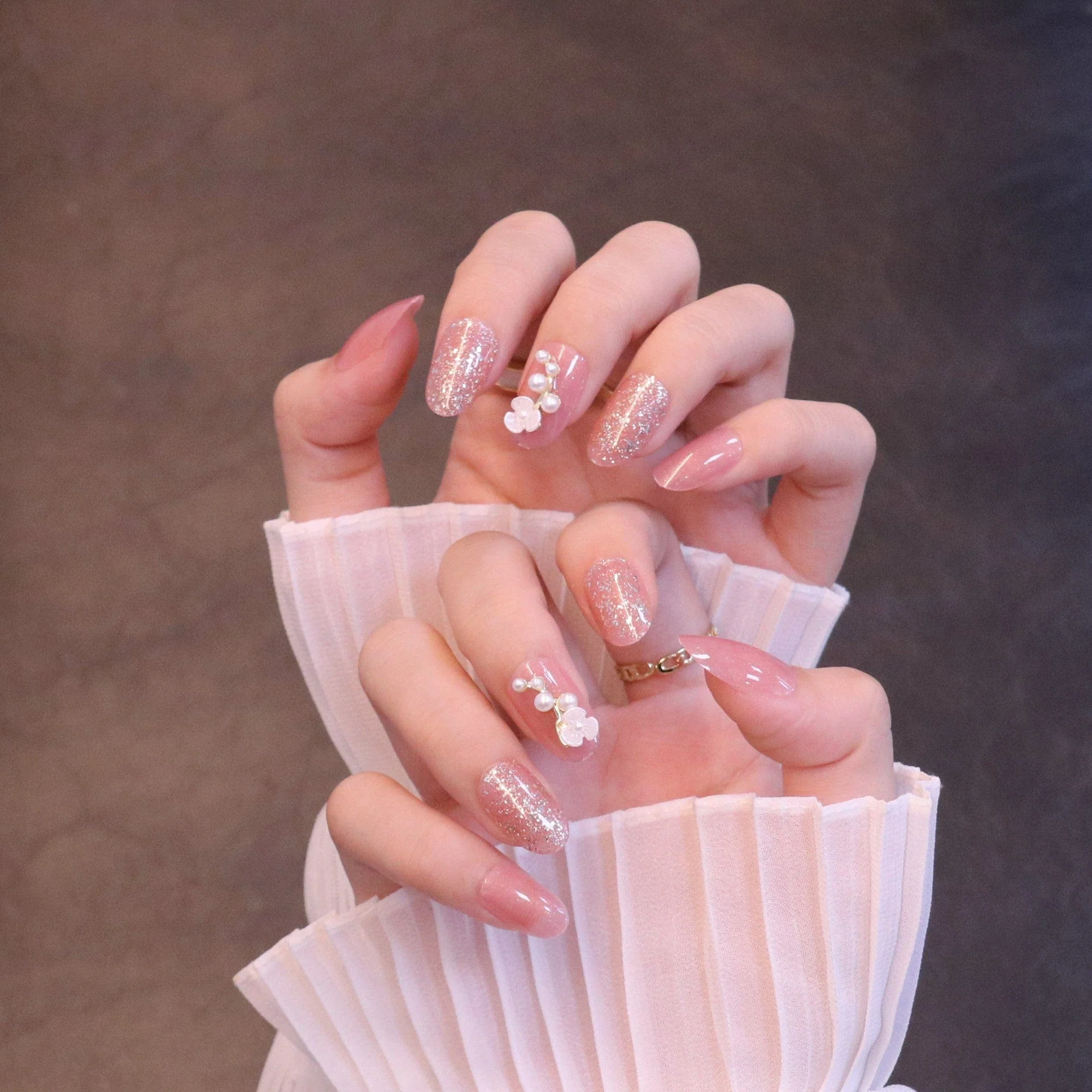 Medium Rounded Baby Pink Press On Nails with Flower and Pearl Charms - Image 3