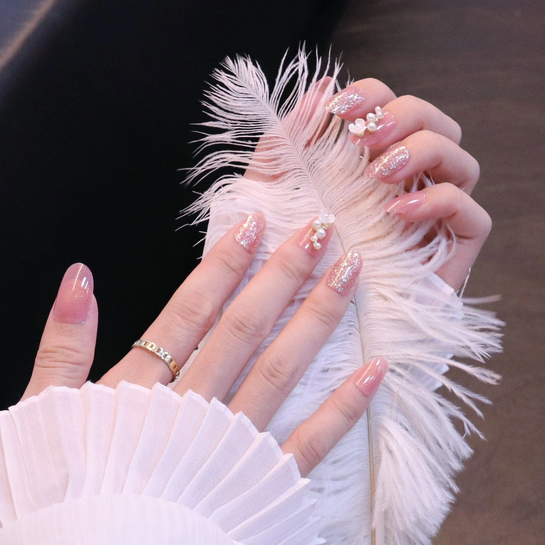 Medium Rounded Baby Pink Press On Nails with Flower and Pearl Charms - Image 5