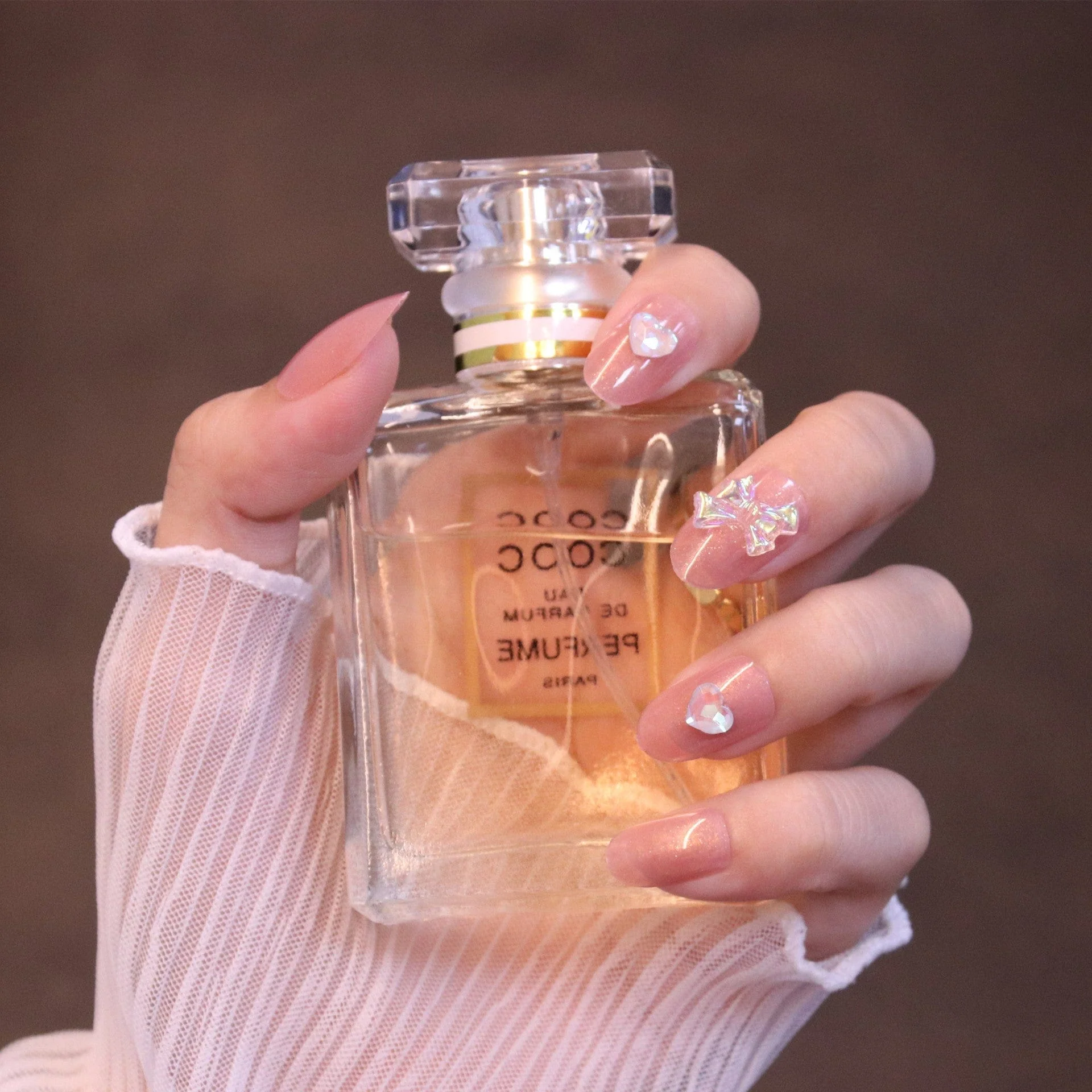 Medium Rounded Light Pink Press On Nails with Iridescent Bow and Heart - Image 3