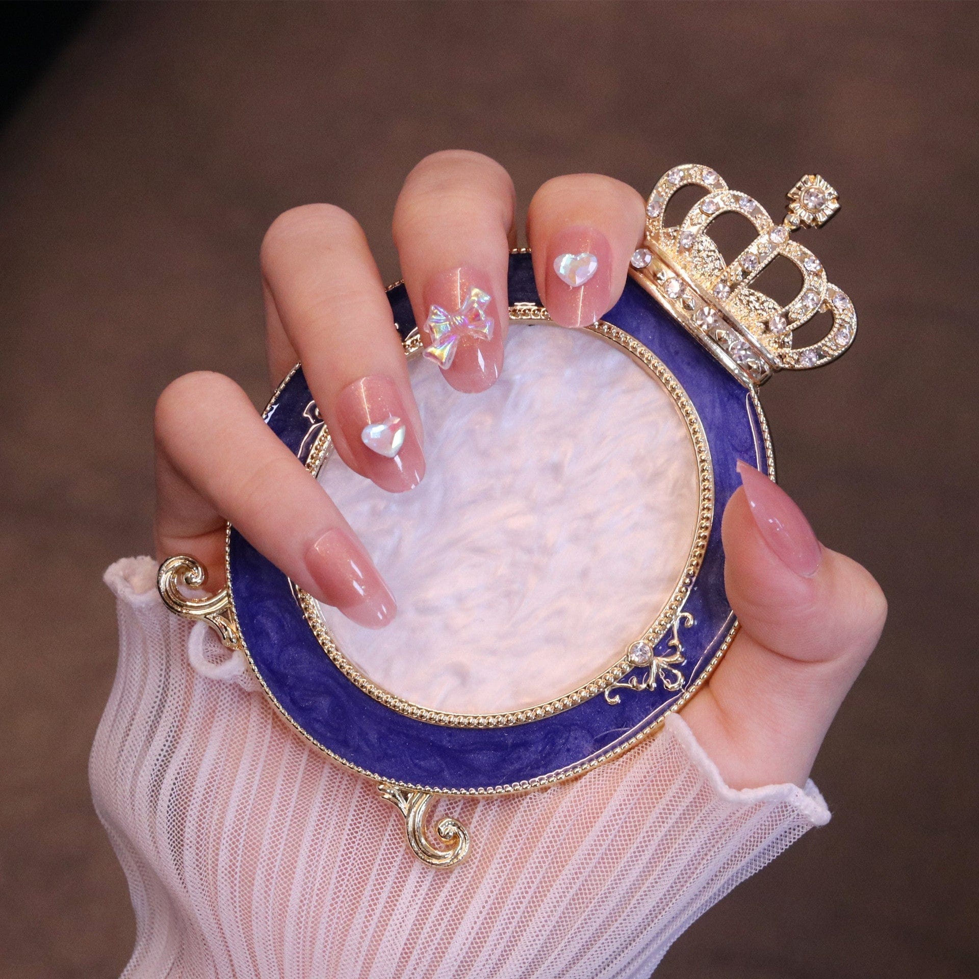 Medium Rounded Light Pink Press On Nails with Iridescent Bow and Heart - Image 4
