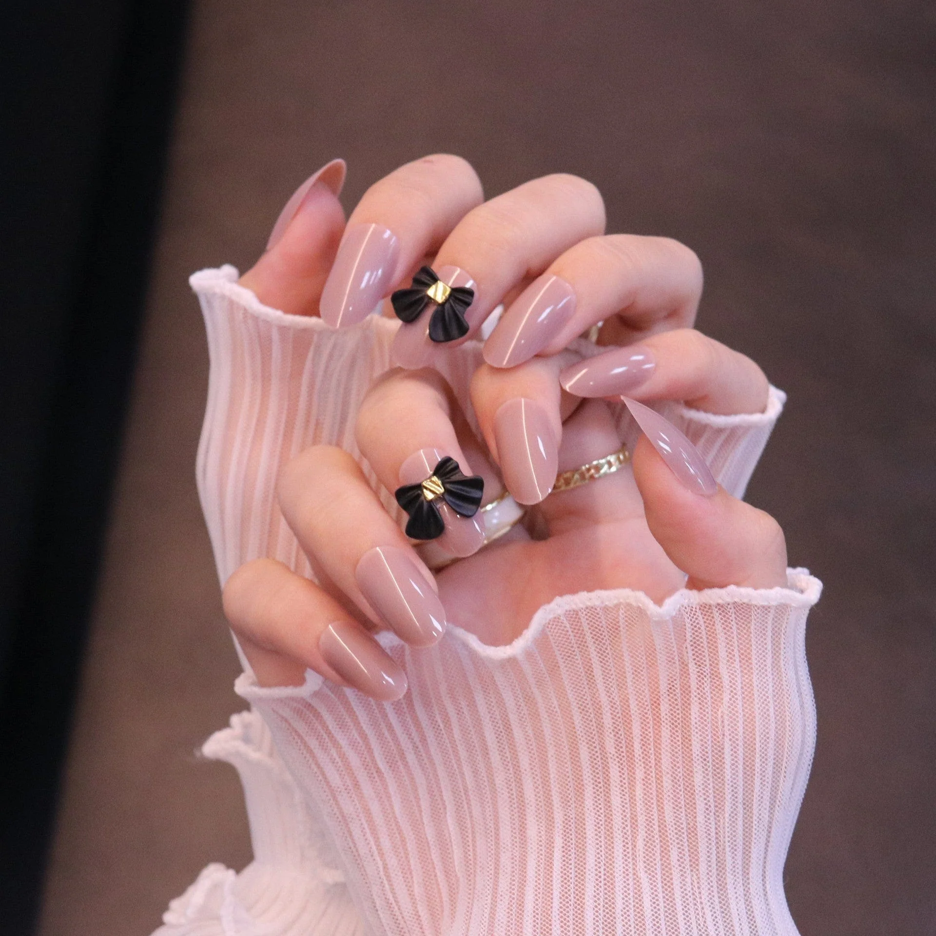 Medium Rounded Nude Press On Nails with Black Bow - Image 2