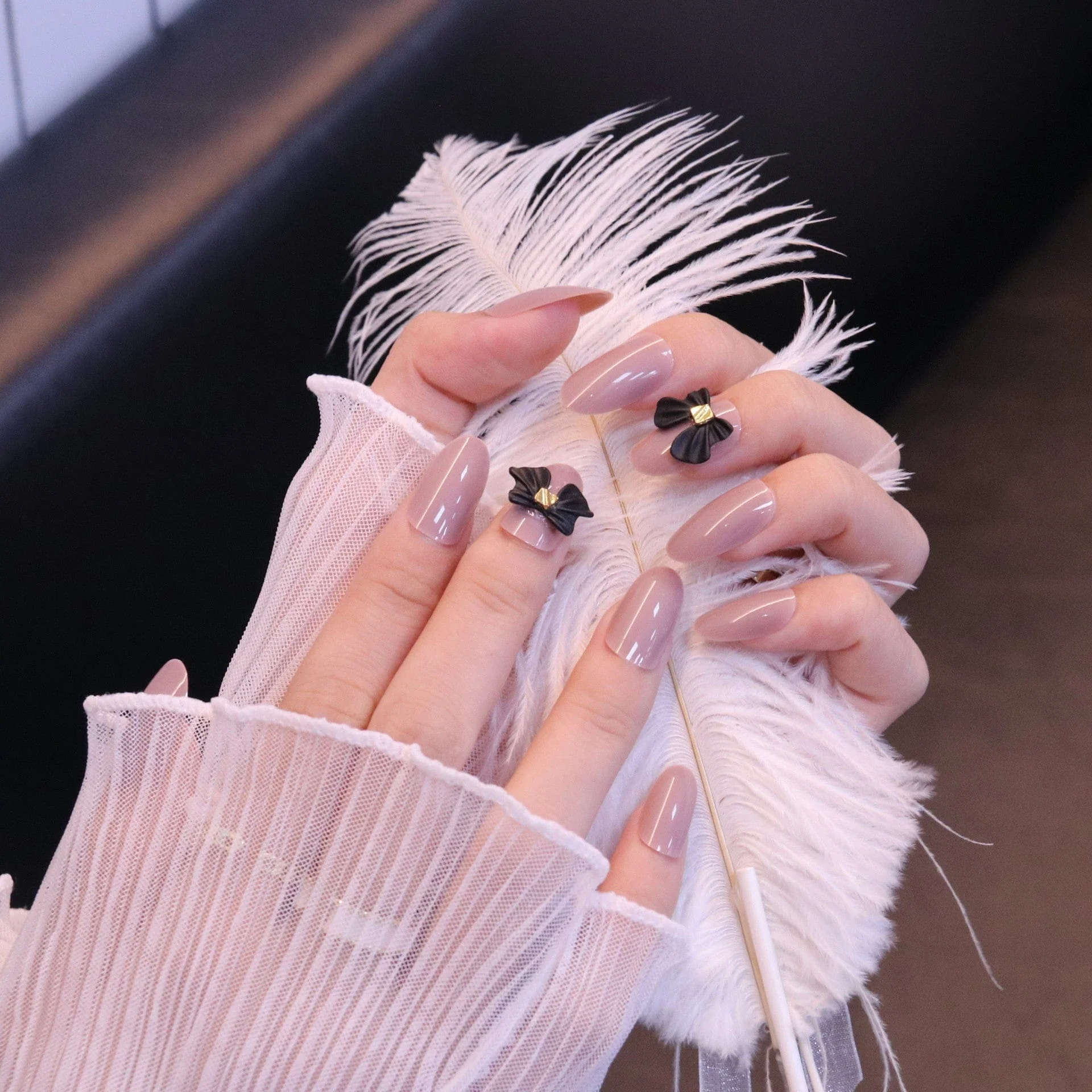 Medium Rounded Nude Press On Nails with Black Bow - Image 4