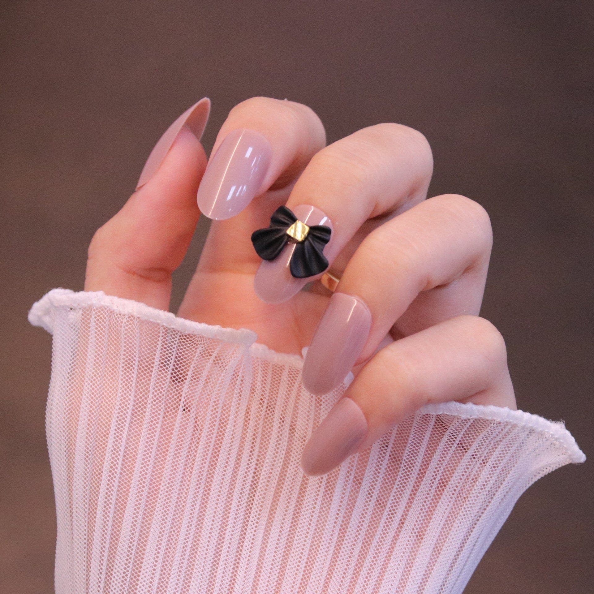 Medium Rounded Nude Press On Nails with Black Bow - Image 6