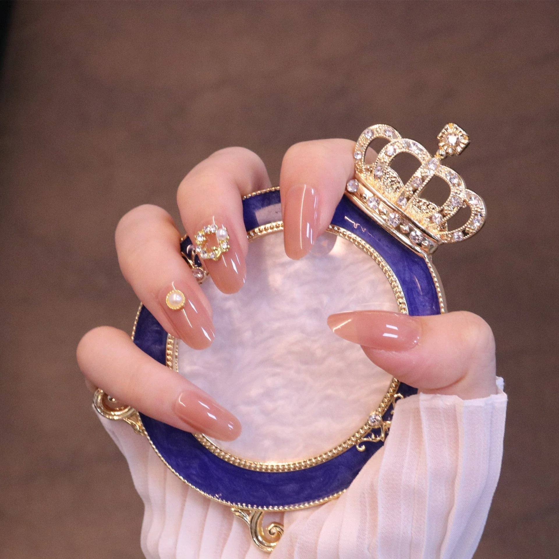Medium Rounded Nude Press On Nails with Wreath Charm and Pearl - Image 5