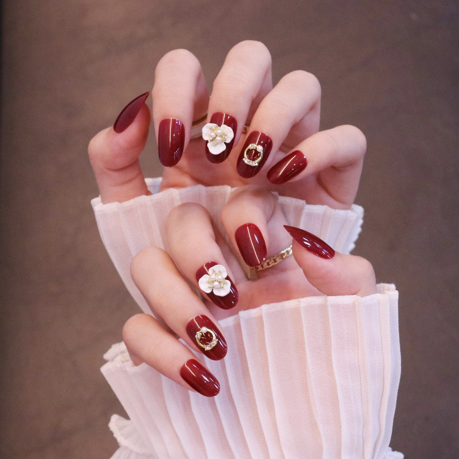 Medium Rounded Red Press On Nails with Flower and Pearl Charms - Image 6