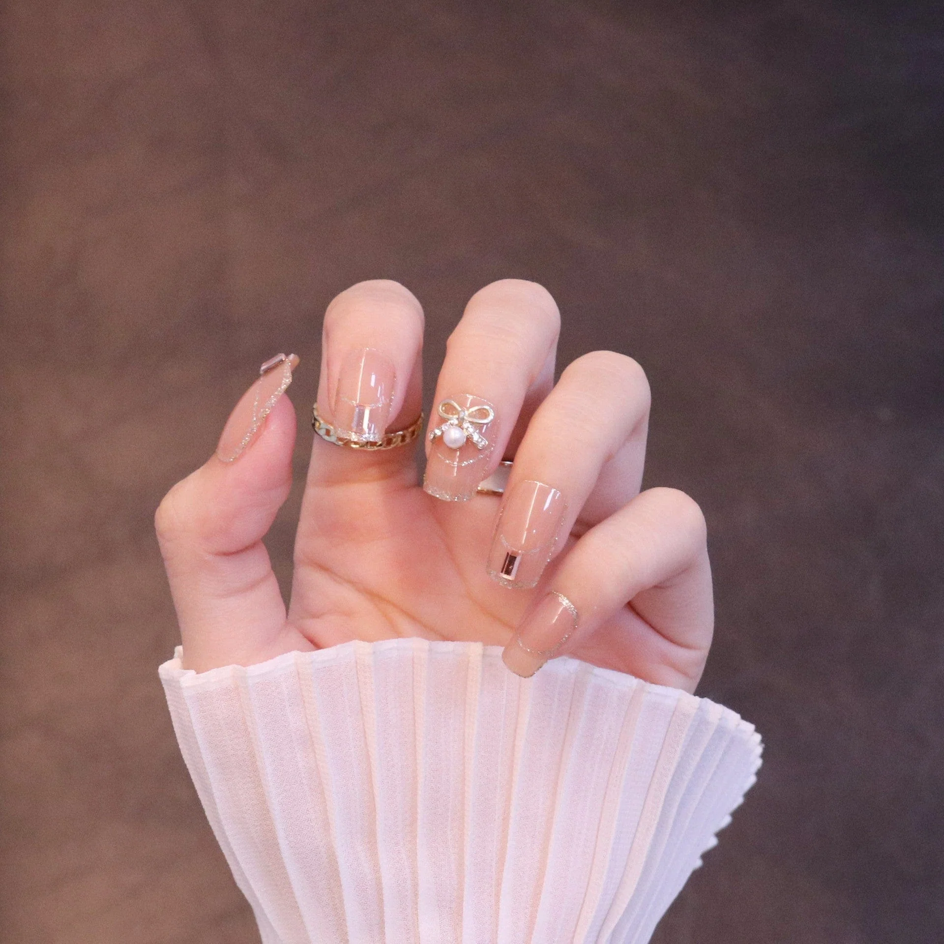 Medium Square Nude Press On Nails with Bow Charm and Pearl - Image 3