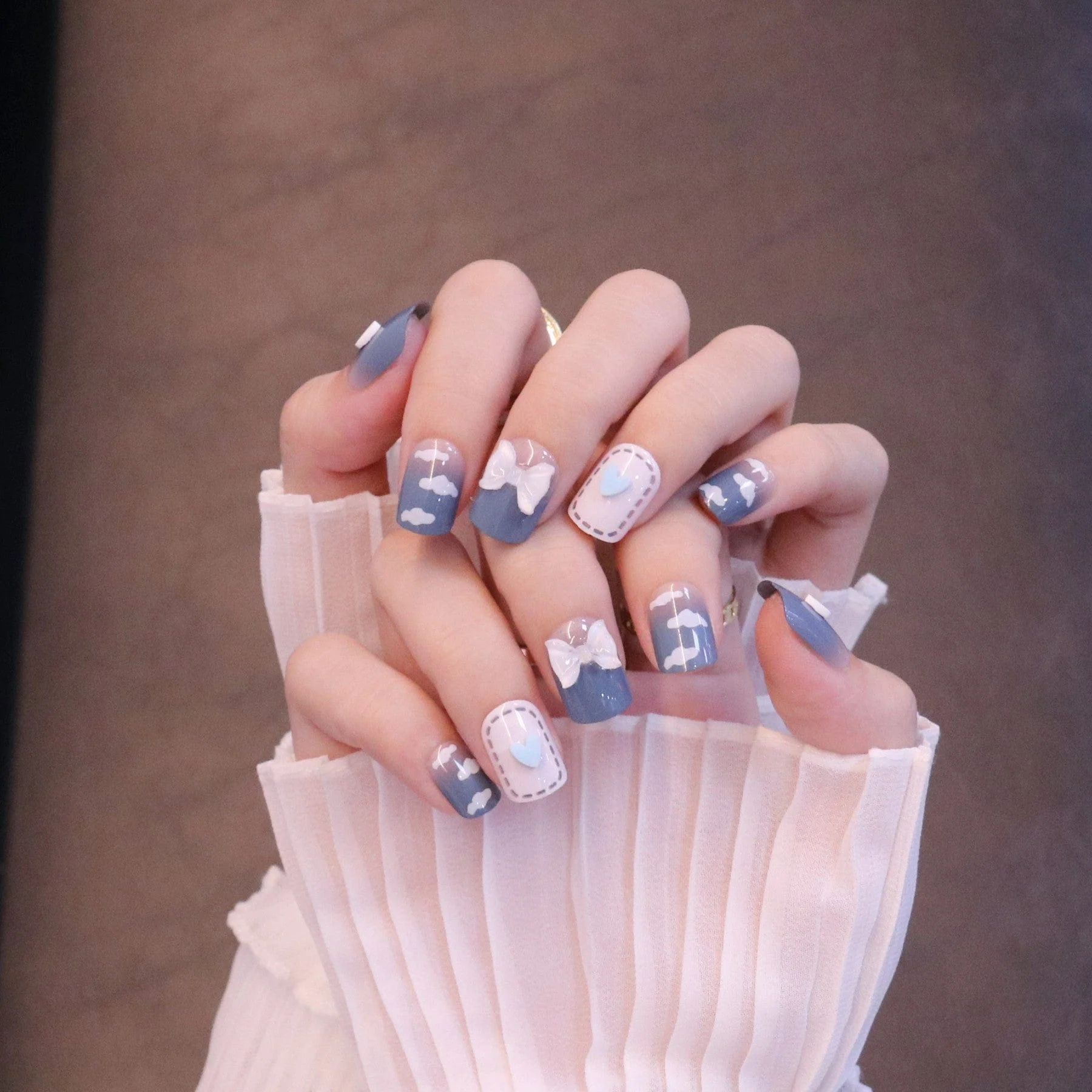 Medium Squared Blue Press On Nails with Bow Charms and Clouds - Image 3